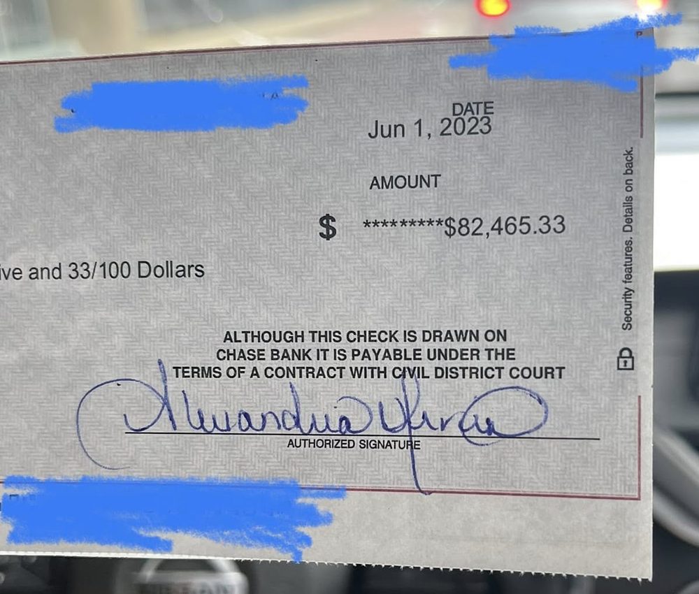 Redacted check for $82,465.33 payable under a contract with Civil District Court, dated Jun 1, 2023